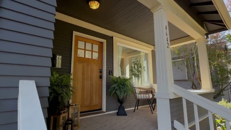 Isaac Ortiz at the front door of 4642 Eastern Ave N in Seattle